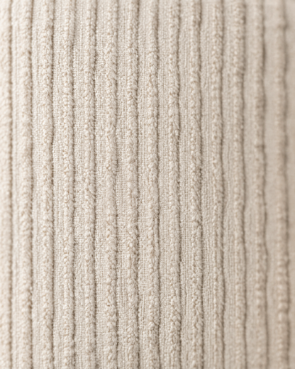 Macro close-up of the cream pinstripe jacquard, fine raised vertical ribs tone on tone
