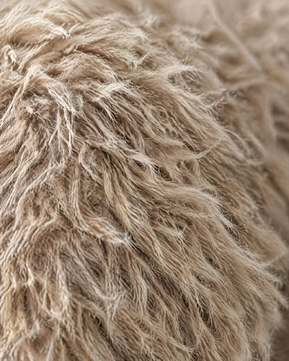 Close-up of long shaggy khaki faux fur