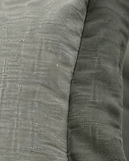 Close-up of sage two-tone flanged cushion cover