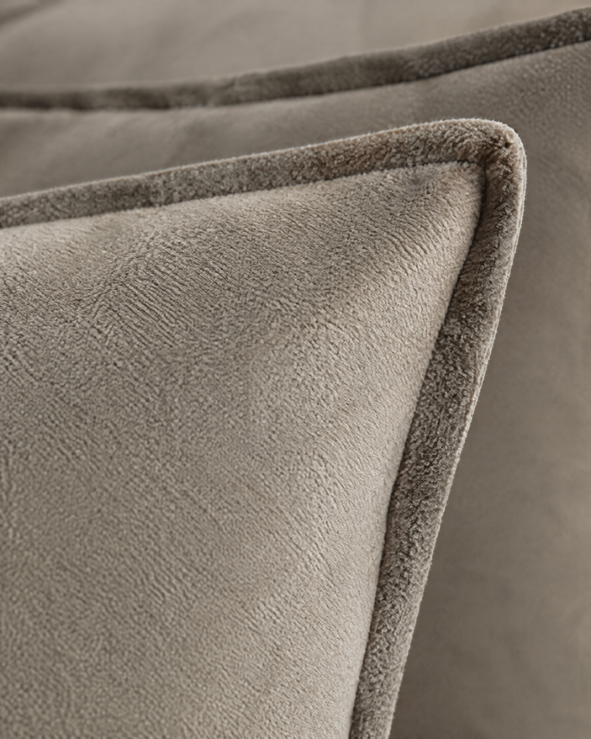 Macro close-up of the two-tone flannel, a soft brushed taupe nap and the flange edge