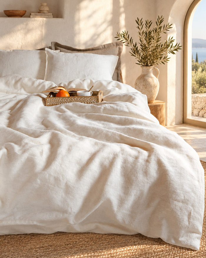 White French linen duvet cover in a Mediterranean bedroom
