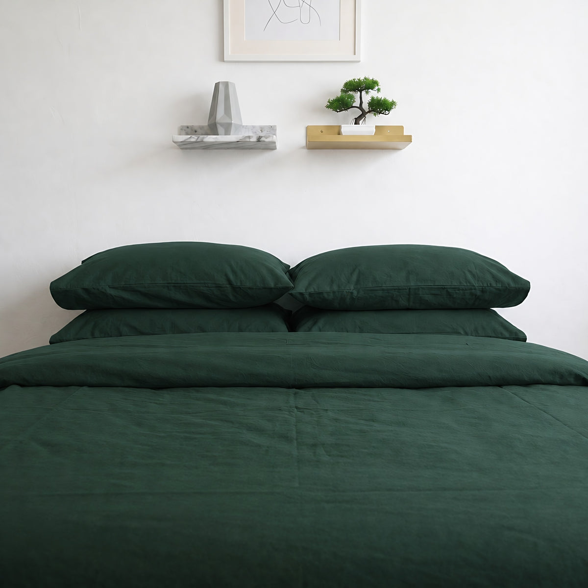 Forest Green plain cotton pillowcases and duvet cover in deep bottle green, front view of the bed