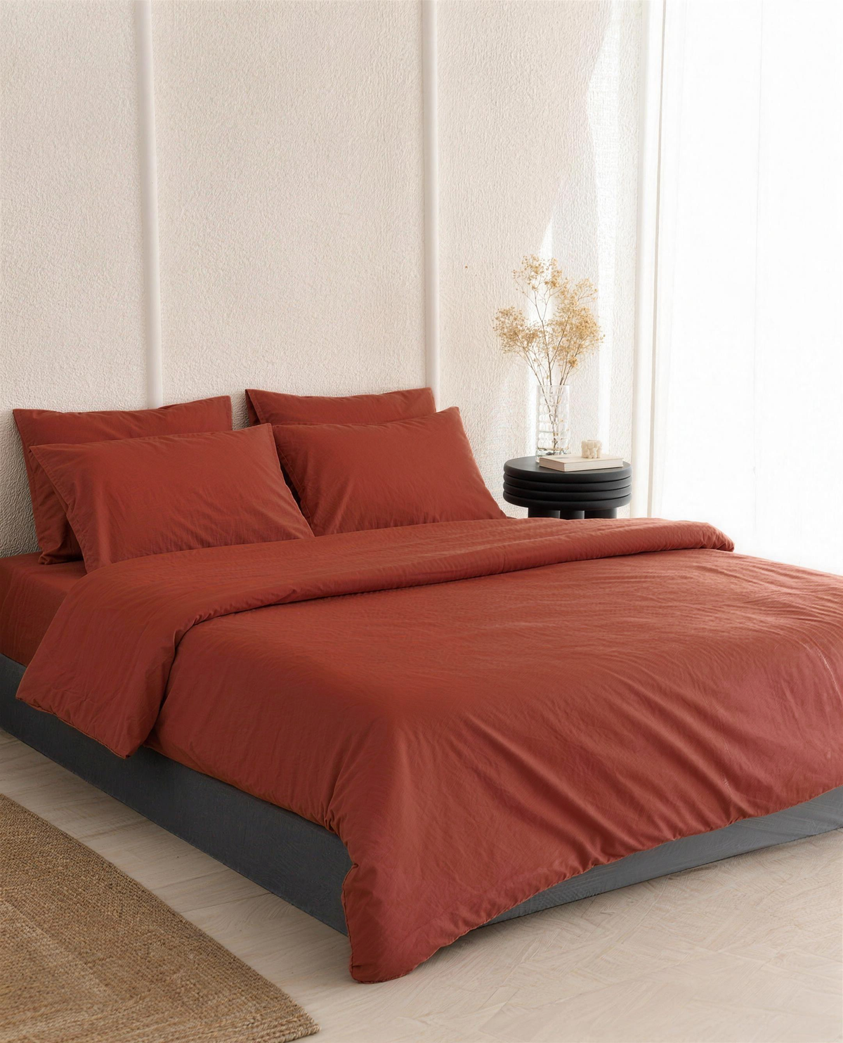 Rust silky cotton sateen duvet cover on a bed