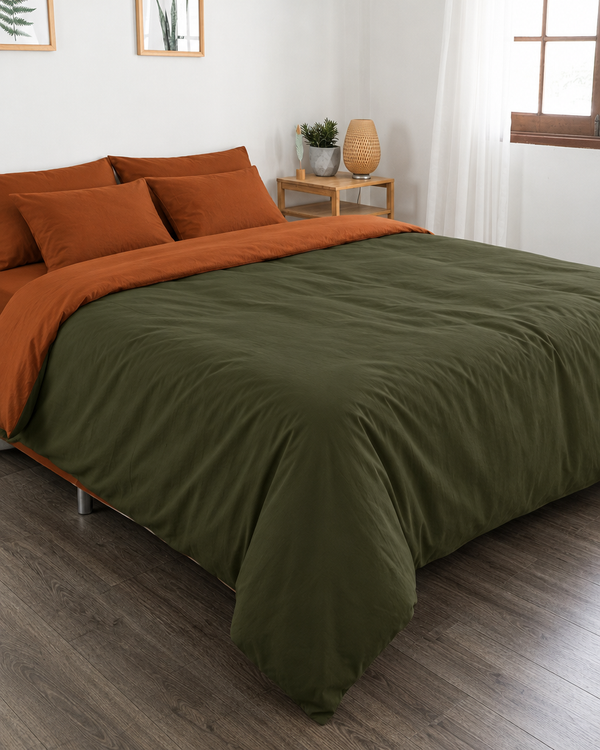 Forest Green duvet cover with terracotta reverse, terracotta fitted sheet and terracotta pillowcases in Plain Cotton