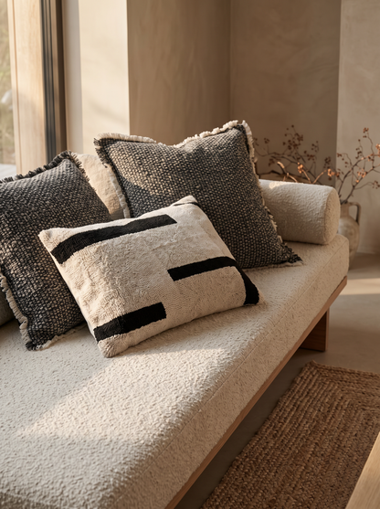 Ivory & Black Loop-Pile Embroidery Cotton Cushion Covers on a boucle daybed