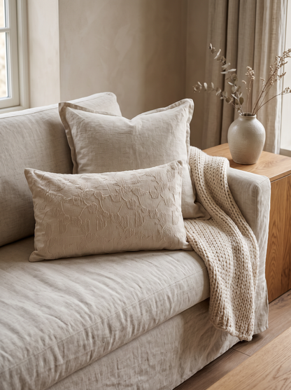 Cream Vine Jacquard Cotton Viscose Oblong Cushion Covers on a linen sofa