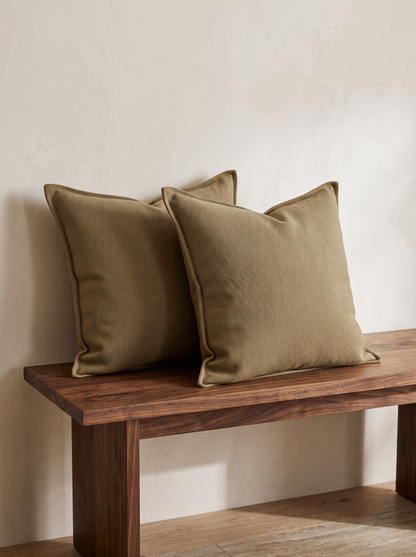 Olive Khaki Slub Jacquard Linen Viscose Cushion Covers, styled at home on a walnut bench