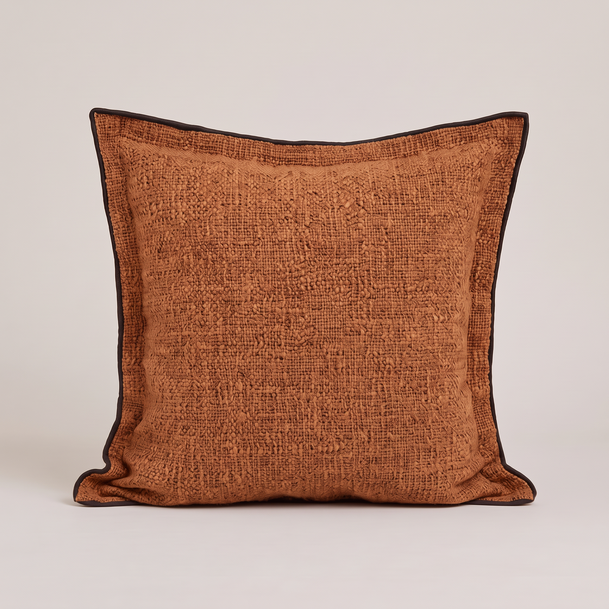 Piped edge cushion cover in orange, single cushion