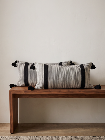 Grey & Black Stripe Tassel Cotton Lumbar Cushion Covers, styled at home on a walnut bench