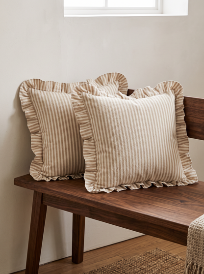 Ruffled Ticking Stripe Cotton Cushion Covers in Beige, styled at home on a walnut bench