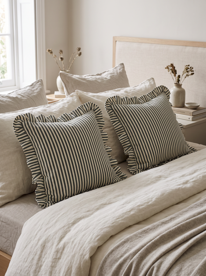 Ruffled Ticking Stripe Cotton Cushion Covers in Green, styled at home on a made bed