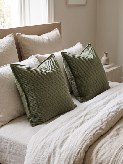 Ribbed Jacquard Cotton Cushion Covers in Grass Green, styled at home on a made bed