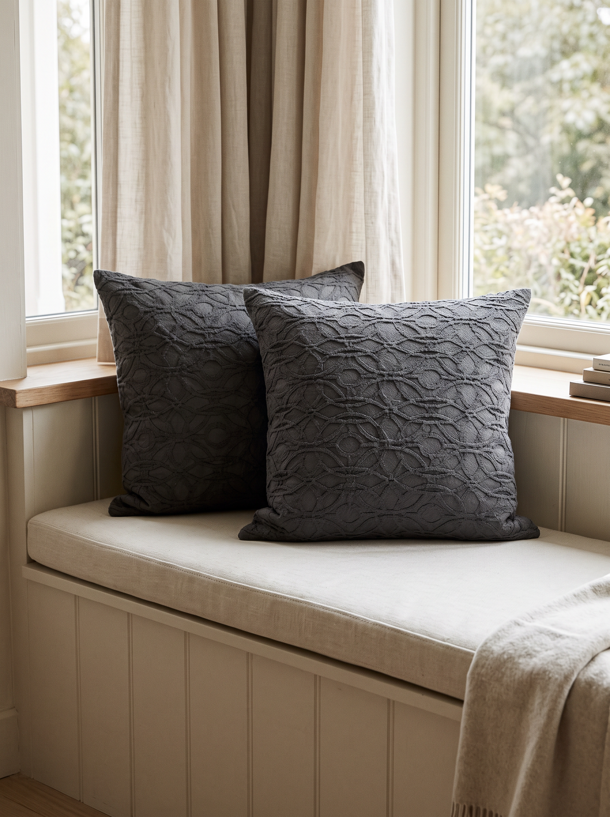 Trellis and Lattice Jacquard Cotton Cushion Covers in Lattice, styled at home on a window seat