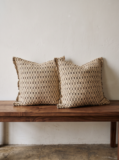 Sand Dot Embroidery Cotton Linen Cushion Covers, styled at home on a walnut bench