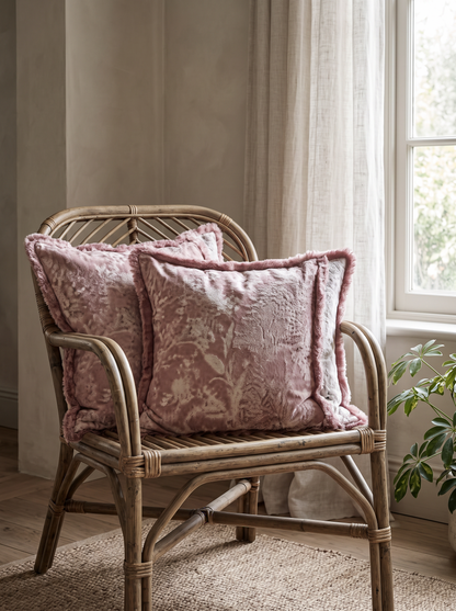 Dusty Rose Floral Tassel Cotton Linen Cushion Covers, styled at home on a rattan armchair by a window