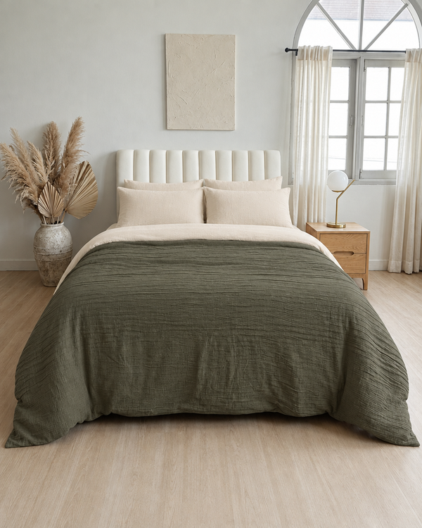 Juniper Green duvet cover with cream reverse, cream fitted sheet and cream pillowcases in Cloud Cotton