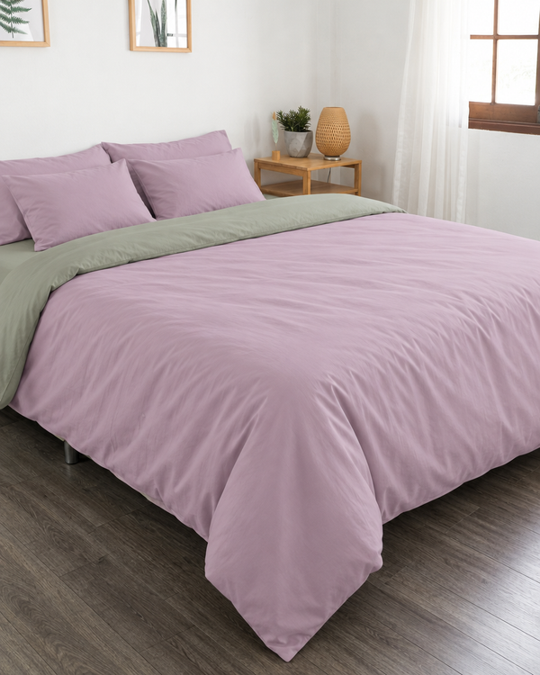 Lilac duvet cover with mint green reverse, mint green fitted sheet and lilac pillowcases in Plain Cotton