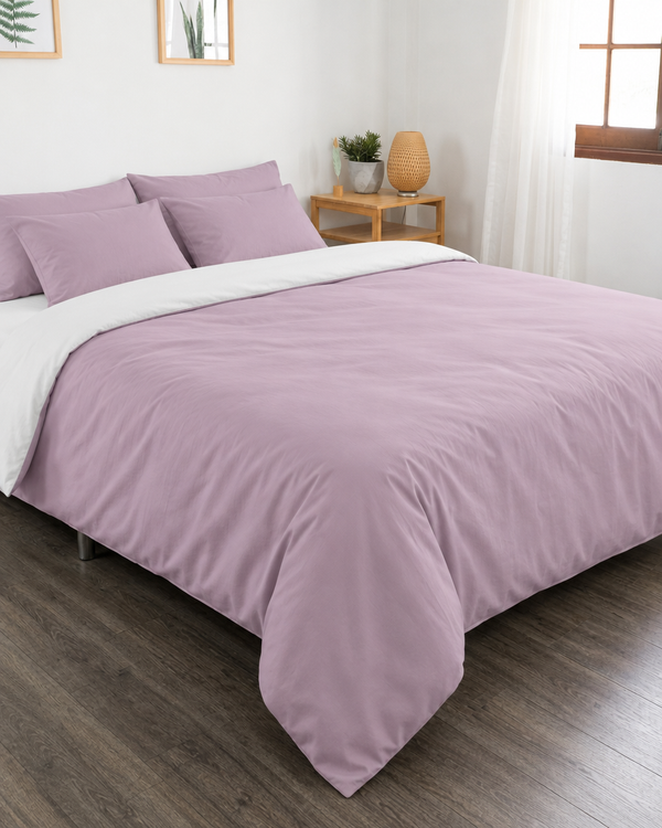 Lilac duvet cover with off white reverse, off white fitted sheet and lilac pillowcases in Plain Cotton