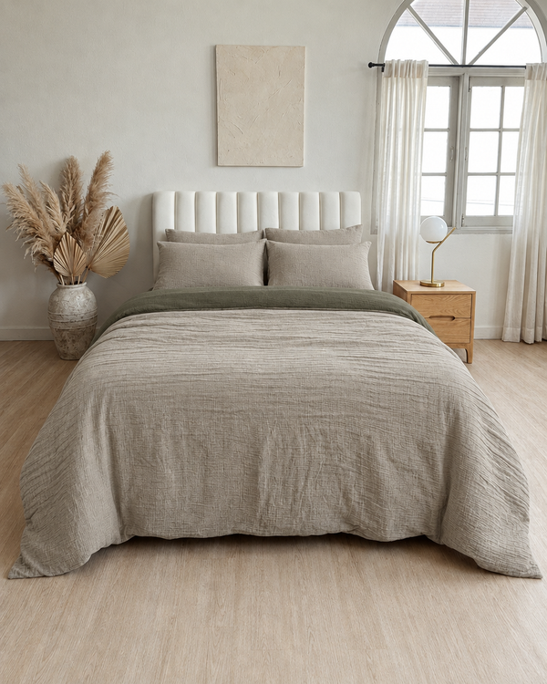 Oat Milk duvet cover with juniper green reverse, juniper green fitted sheet and oat milk pillowcases in Cloud Cotton