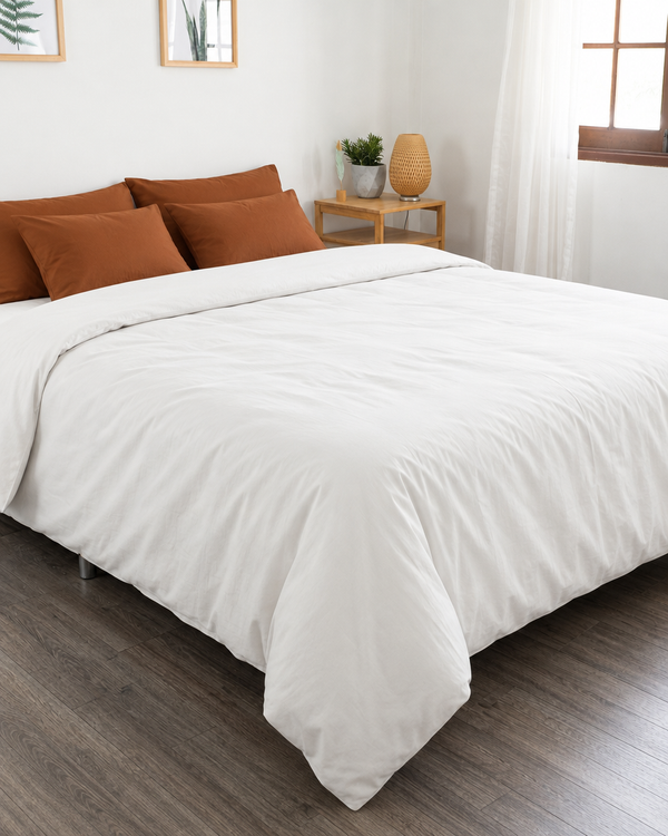Off White duvet cover, off white fitted sheet and terracotta pillowcases in Plain Cotton