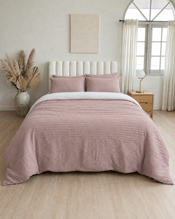Pale Pink duvet cover with off white reverse, off white fitted sheet and pale pink pillowcases in Cloud Cotton