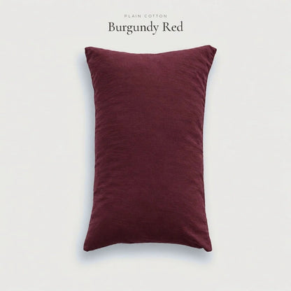 Burgundy Red wine Plain Cotton pillowcase, studio shot on pale grey