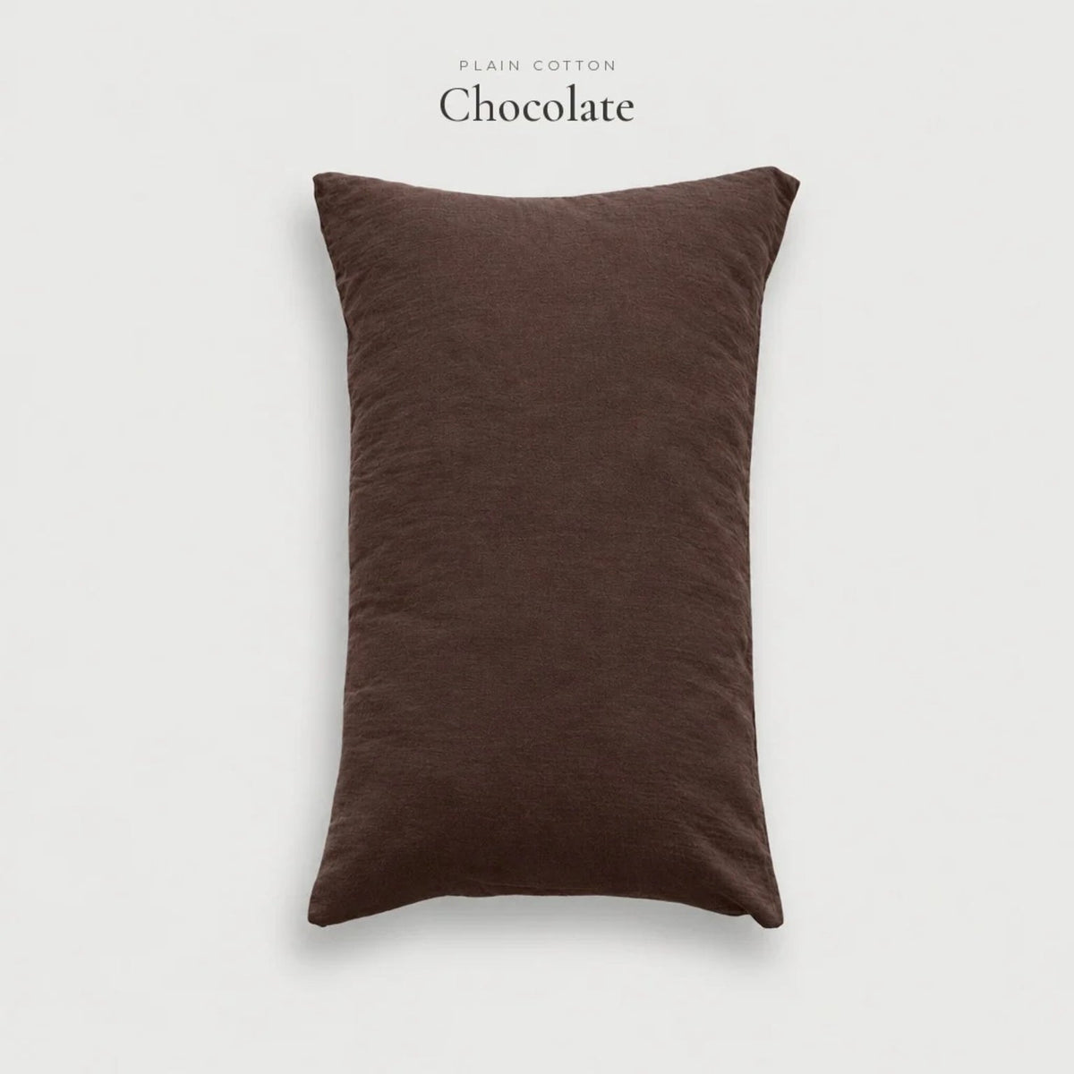Chocolate brown Plain Cotton washed pillowcase, studio shot on a pale grey background