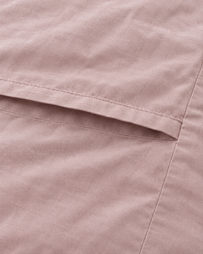 Close-up of stitched envelope opening hem of the pillowcase in Pale Pink Plain Cotton
