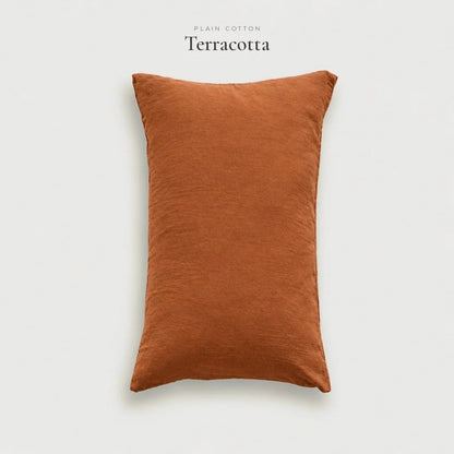 Terracotta burnt orange Plain Cotton pillowcase, studio shot