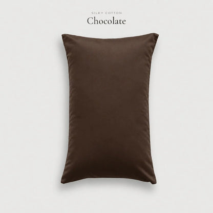 Chocolate brown Silky Cotton sateen pillowcase, studio shot on a pale grey background