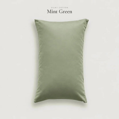 Mint Green Silky Cotton pillowcase in soft sage sateen, studio shot