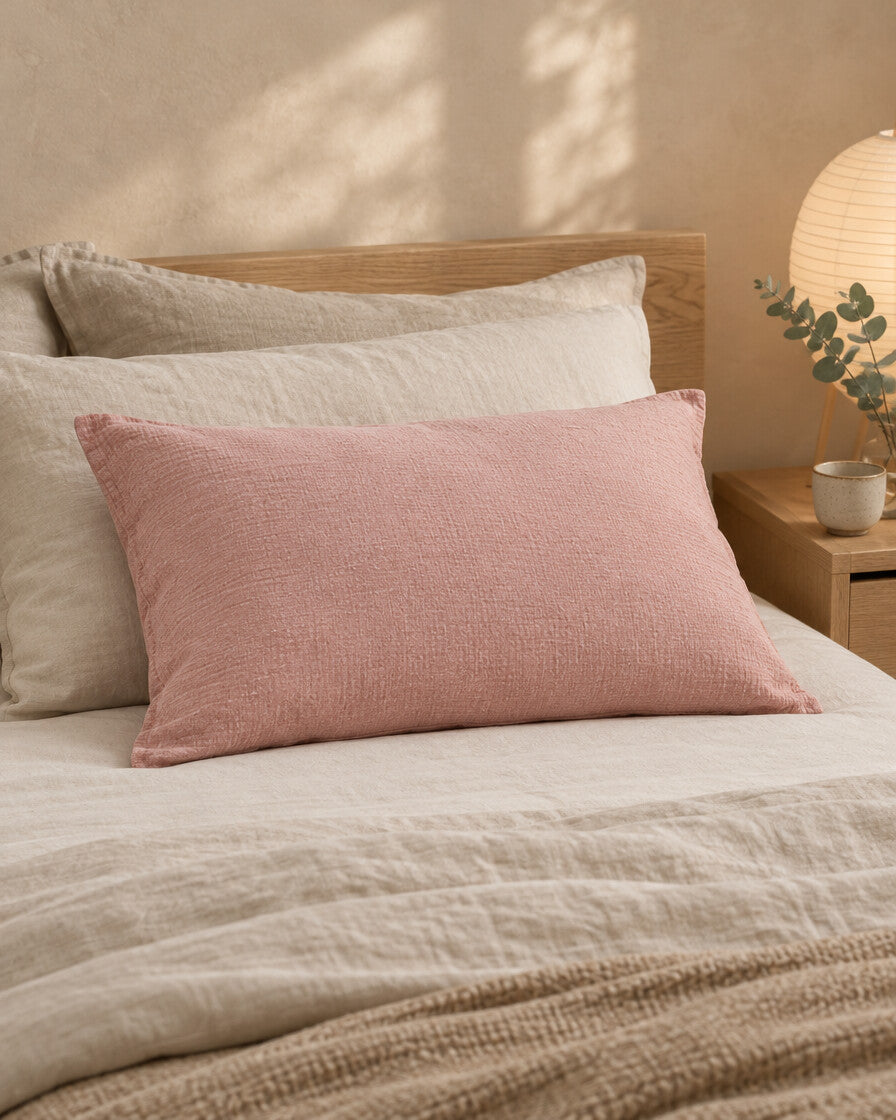 Pale Pink cloud cotton pillowcase, styled in a serene Japandi bedroom
