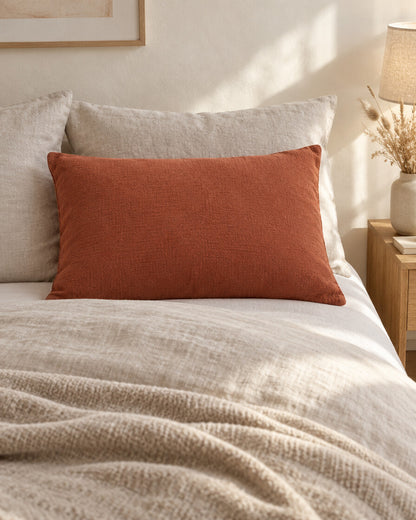 Copper cloud cotton pillowcase, styled in a calm sunlit Scandinavian bedroom