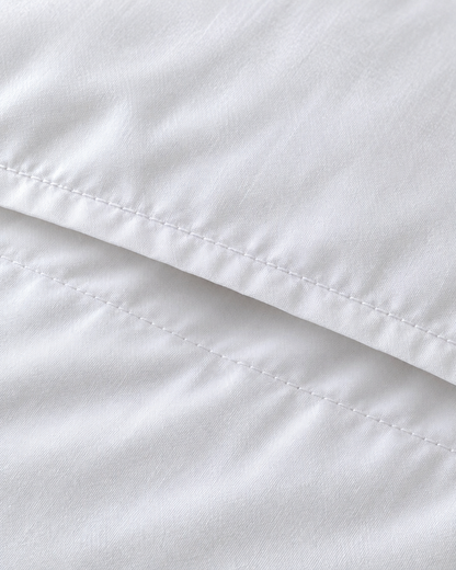 Close-up of stitched envelope opening hem of the pillowcase in Milky White Silky Cotton