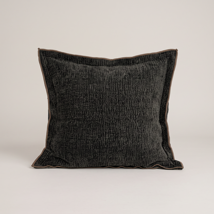 Piped edge cushion cover in black, single cushion