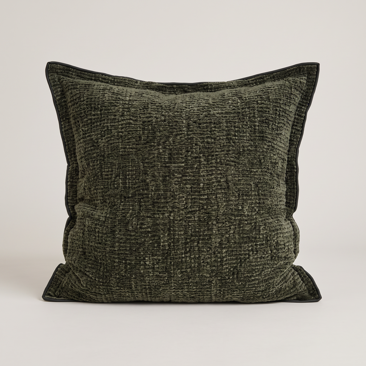 Piped edge cushion cover in dark green, single cushion