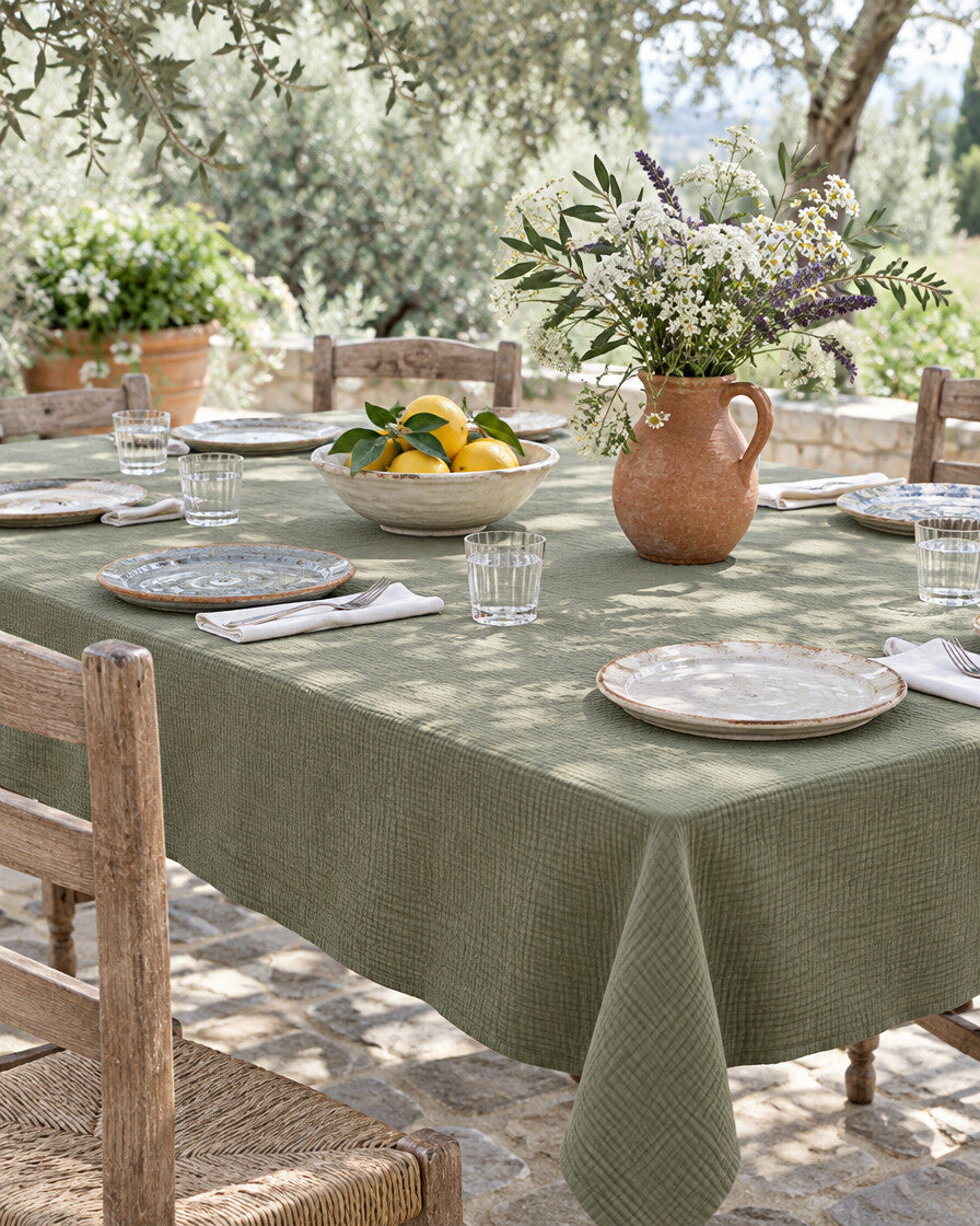 Juniper green cloud cotton tablecloth set for a garden lunch under dappled olive-tree shade