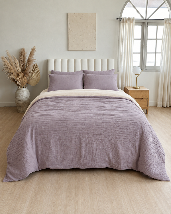 Taro duvet cover with cream reverse, cream fitted sheet and taro pillowcases in Cloud Cotton