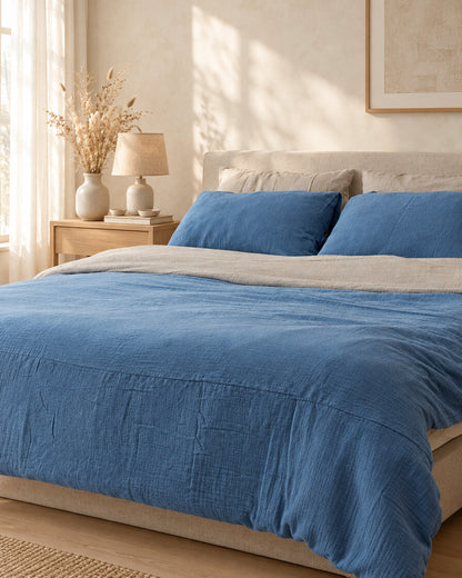 Two-tone cloud cotton bedding, styled in a calm sunlit Scandinavian bedroom